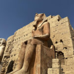 A statue of a man in Karnak Temple