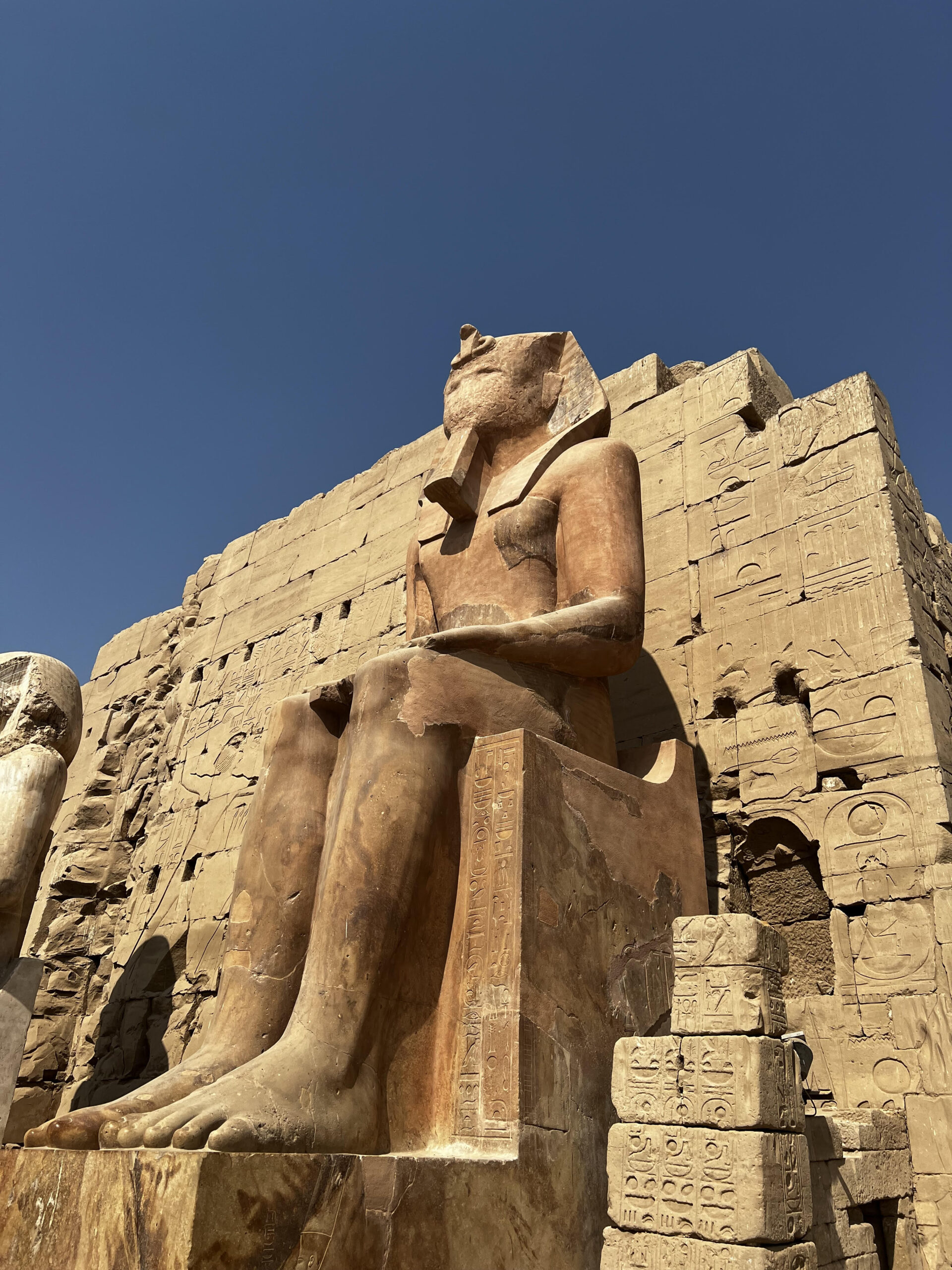 A statue of a man in Karnak Temple