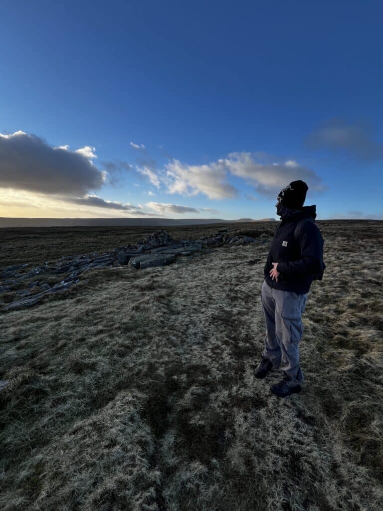 A friend of the author's in the forground of the pretty Welsh landscape