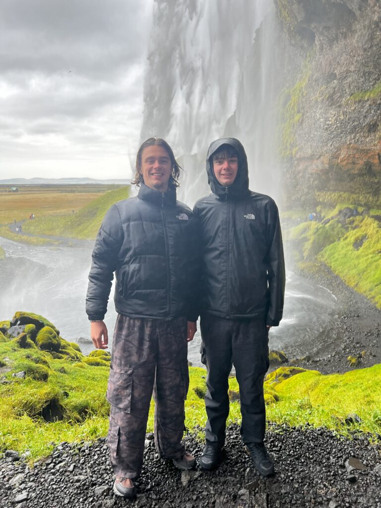 The author and his brother by Seljalandsfoss Waterfall