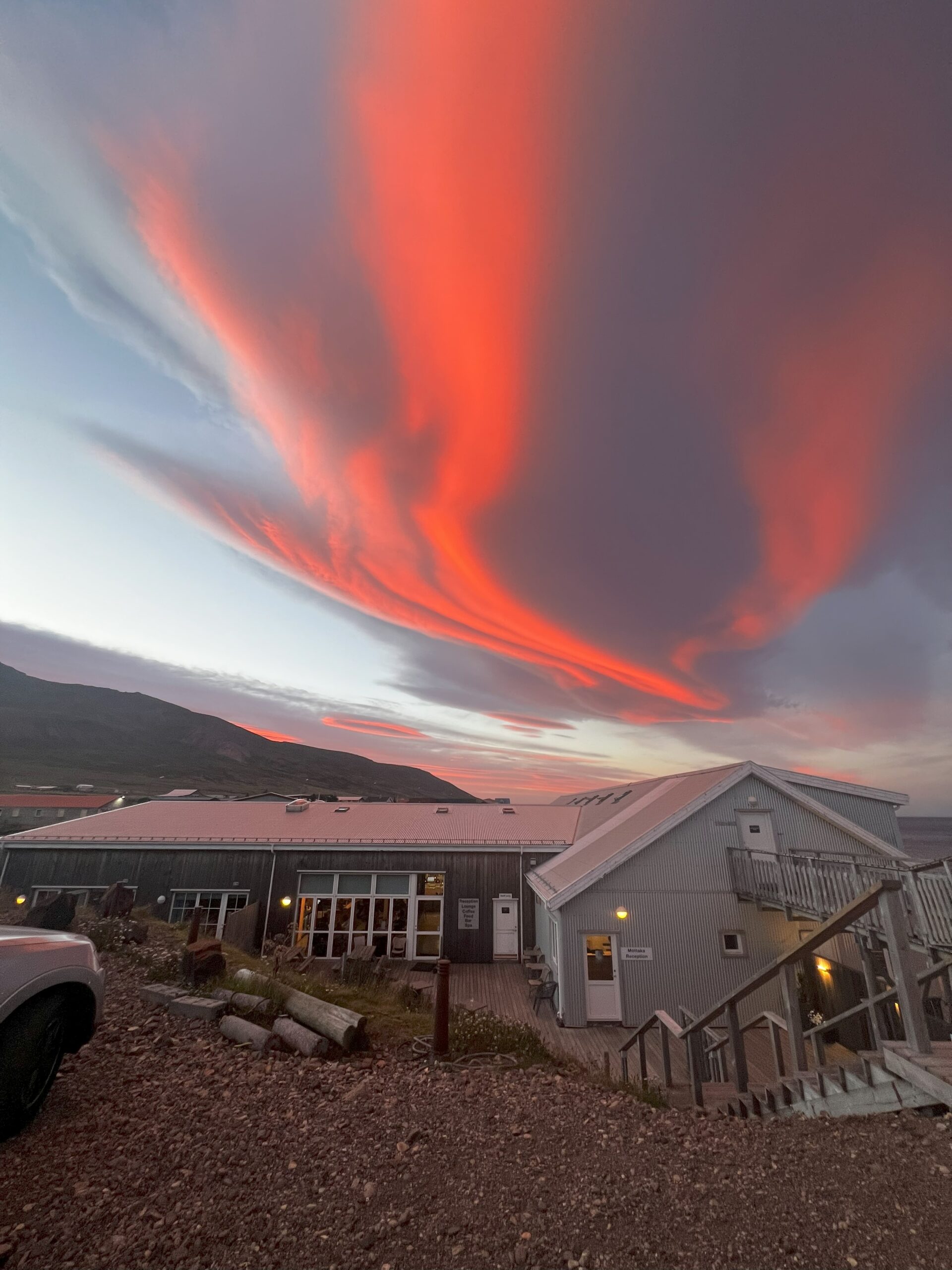 The exotic sunset sky above the hotel/restaurant for the evening.