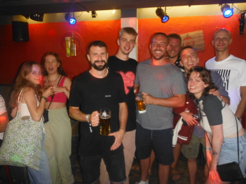 A bunch of solo travellers who went out together with the author Tom in Lisbon