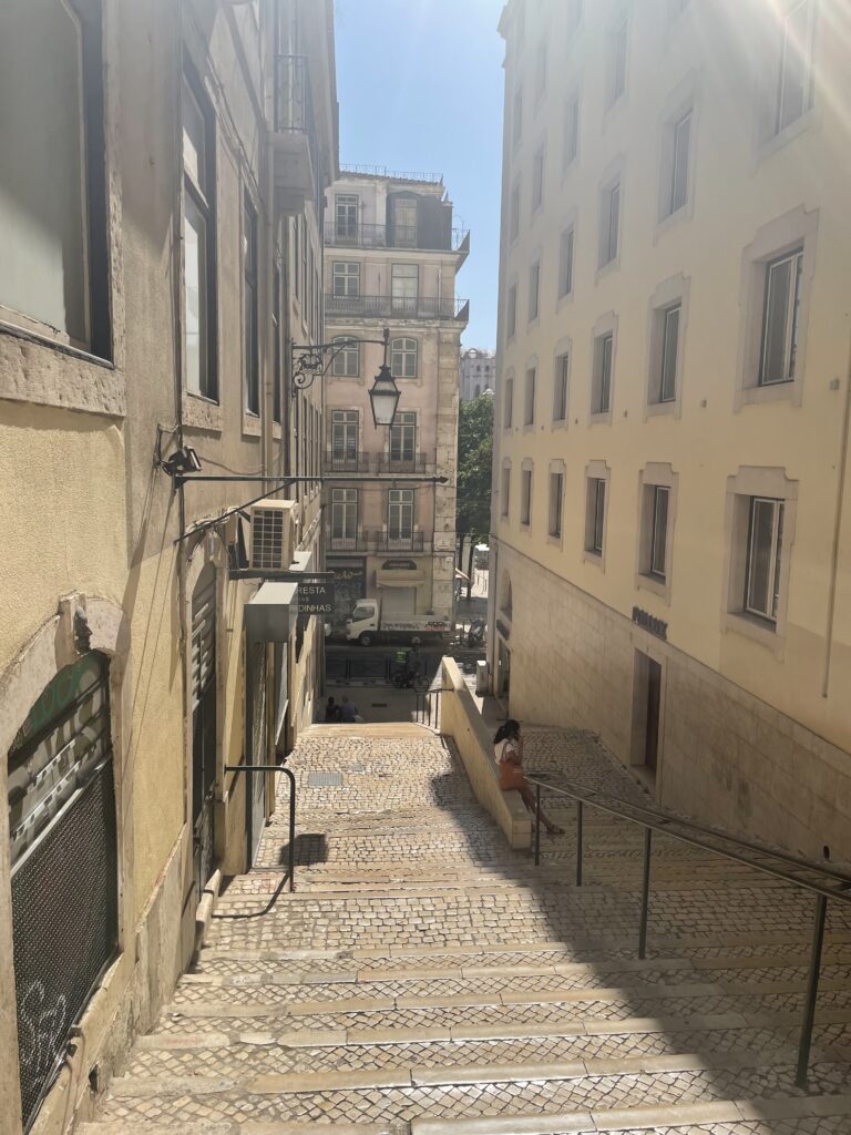 A quiet Lisbon street during the day.