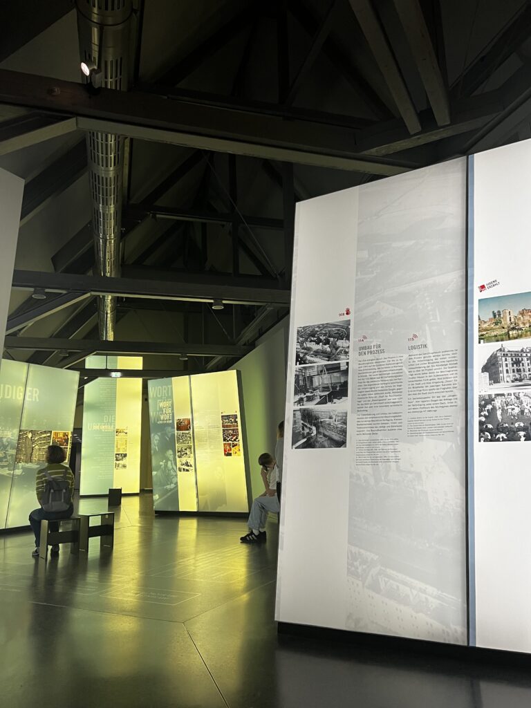 The image shows the exhibit inside the Palace of Justice