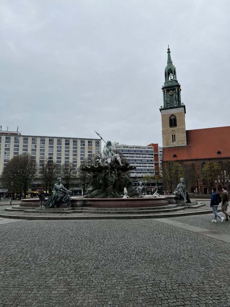 Neptune's Fountain can be seen with St Mary's Church in the background.