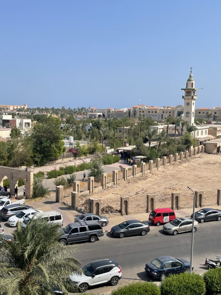 A mosque from the view point of an apartment on a sunny day in Hurghada.