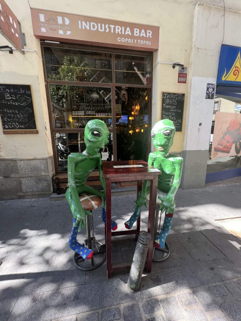 2 goofy statues of aliens in Madrid