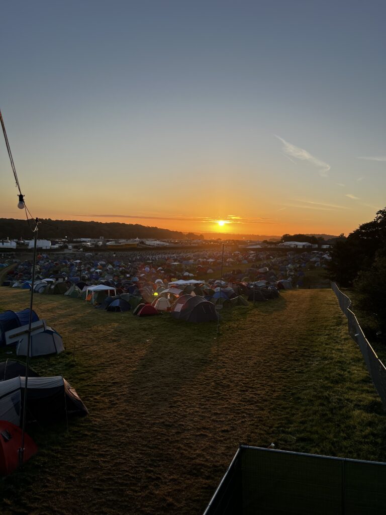 A campsite from the view of a firetower at a festival