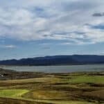 A landscape photo of scenary in Iceland. Mountains can be seen in the distance