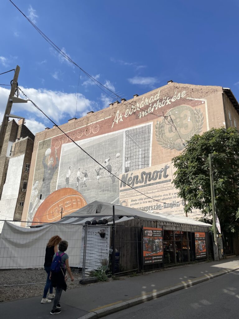 A mural dictating some sort of Hungarian football match in Budapest