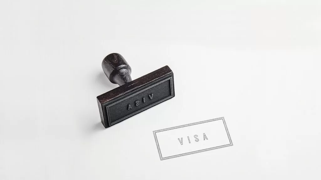 A stamp that says "visa" on it