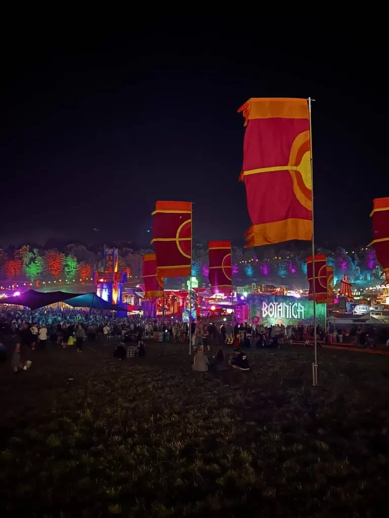 Lots of people crowded around the Botanica set at Boomtown.